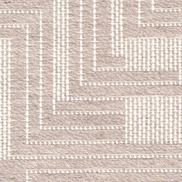 A close-up of a textured fabric featuring a geometric pattern in gray and white.